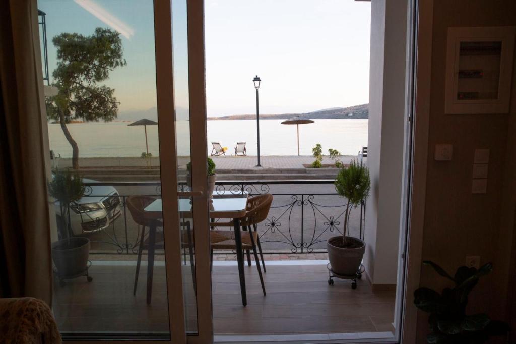 Sea view from the living room balcony of Nerissa apartment Itea