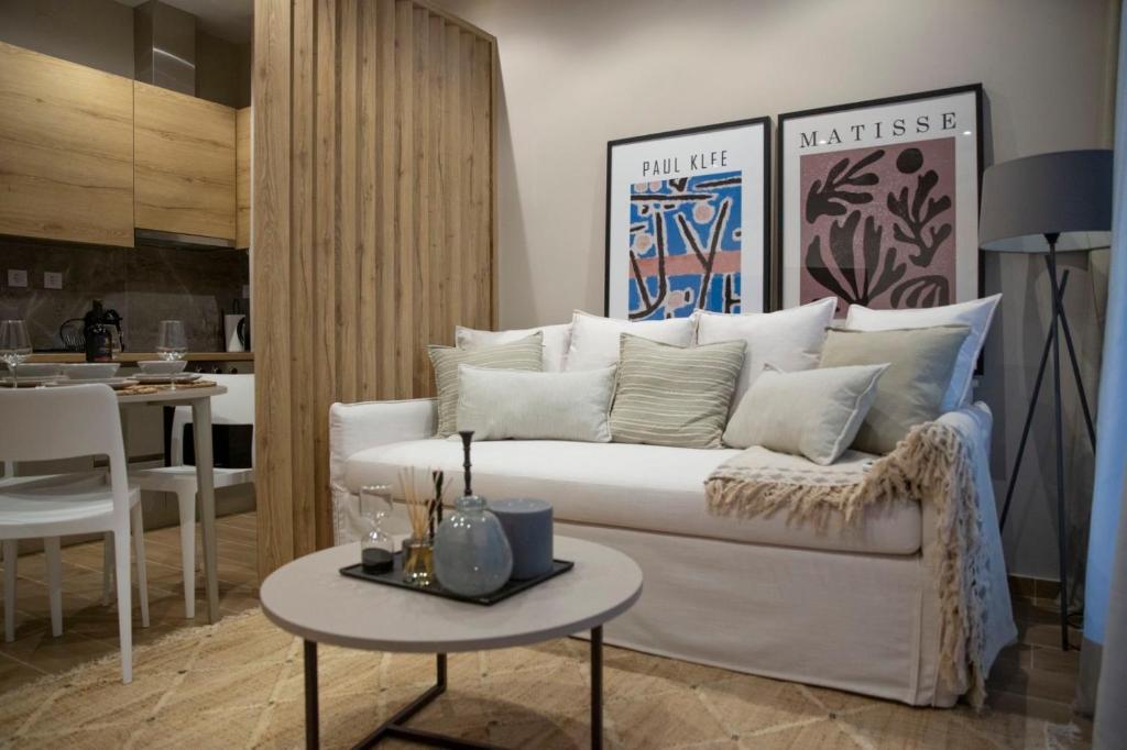 Modern living room sofa at Nerissa seafront apartment Itea